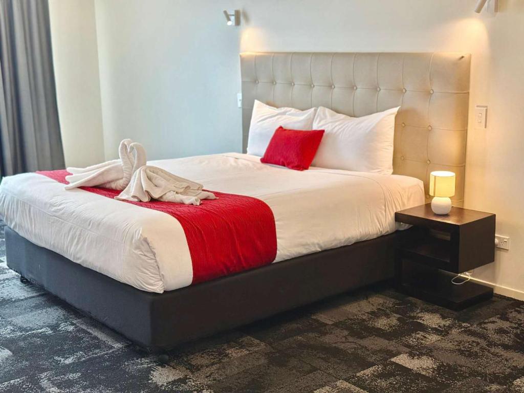 Postel nebo postele na pokoji v ubytování Zeta Motel