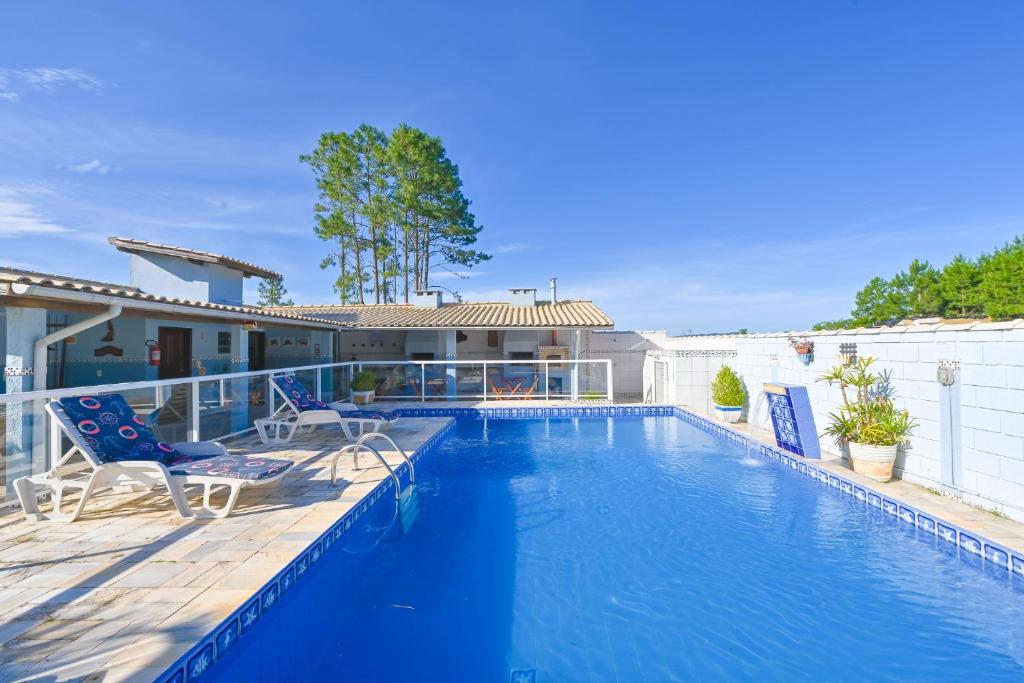 Бассейн в Pousada Barra da Ferrugem или поблизости