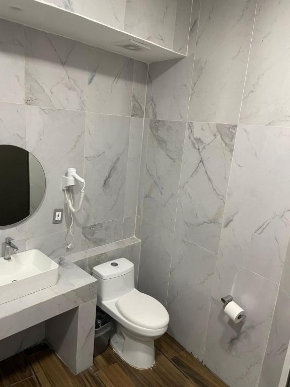 Koupelna v ubytování Hotel ANB Aeropuerto Guadalajara