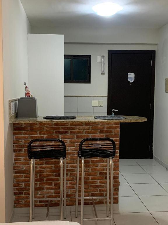 Kuchyň nebo kuchyňský kout v ubytování Marsallis Flat 202 - Natal RN