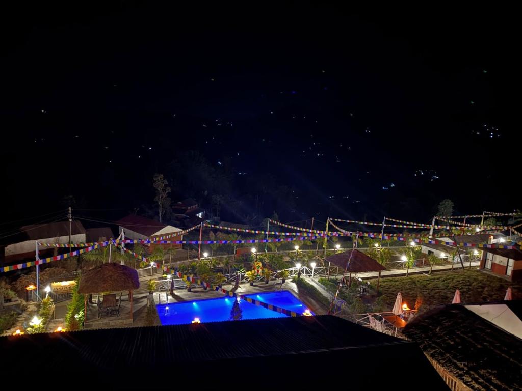 Bazén v ubytování Annapurna Forest Resort nebo v jeho okolí