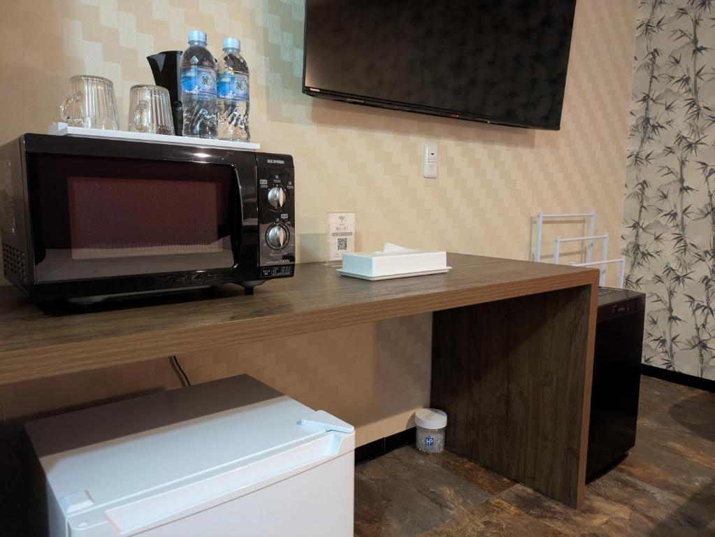 Kuchyň nebo kuchyňský kout v ubytování Hotel RIO新宿