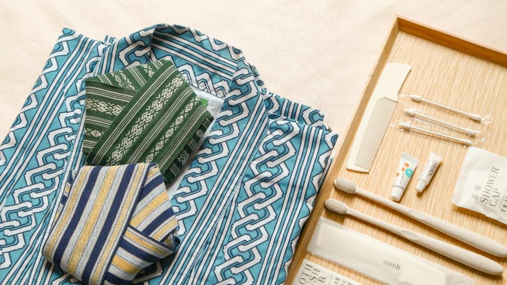 a pair of ties sitting on top of a table at 熱海山荘 in Atami