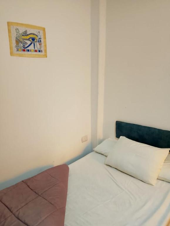 Postel nebo postele na pokoji v ubytování G Hostel inn pyramids