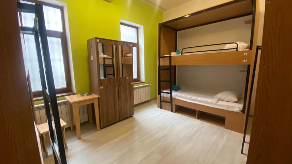 Postel nebo postele na pokoji v ubytování Central Hostel