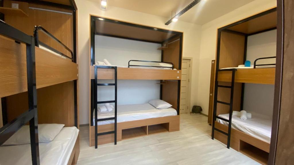 Postel nebo postele na pokoji v ubytování Central Hostel