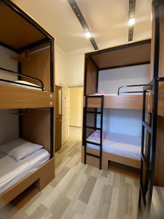 Postel nebo postele na pokoji v ubytování Central Hostel