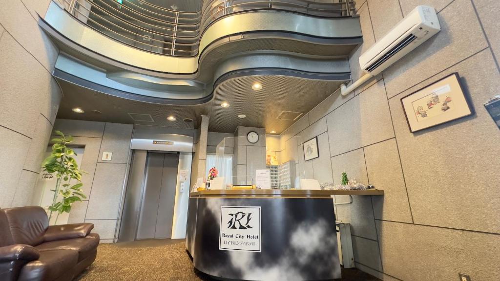Kuchyň nebo kuchyňský kout v ubytování ロイヤルシティホテル Royalcity Hotel