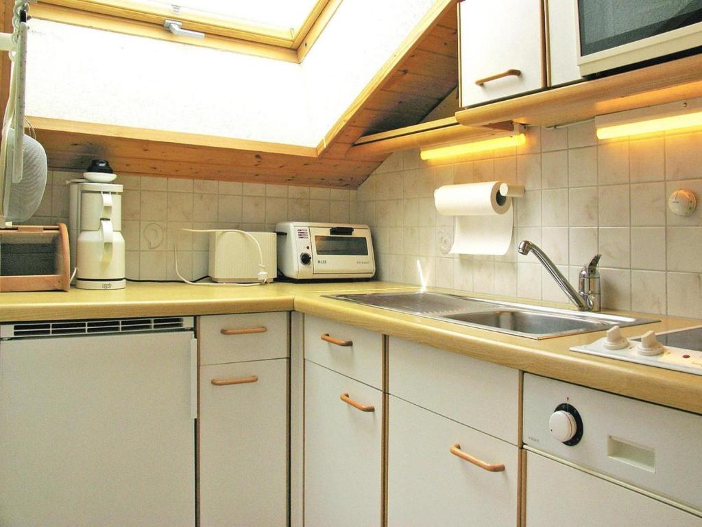 Kuchyňa alebo kuchynka v ubytovaní Landhaus Salzburg, Dienten