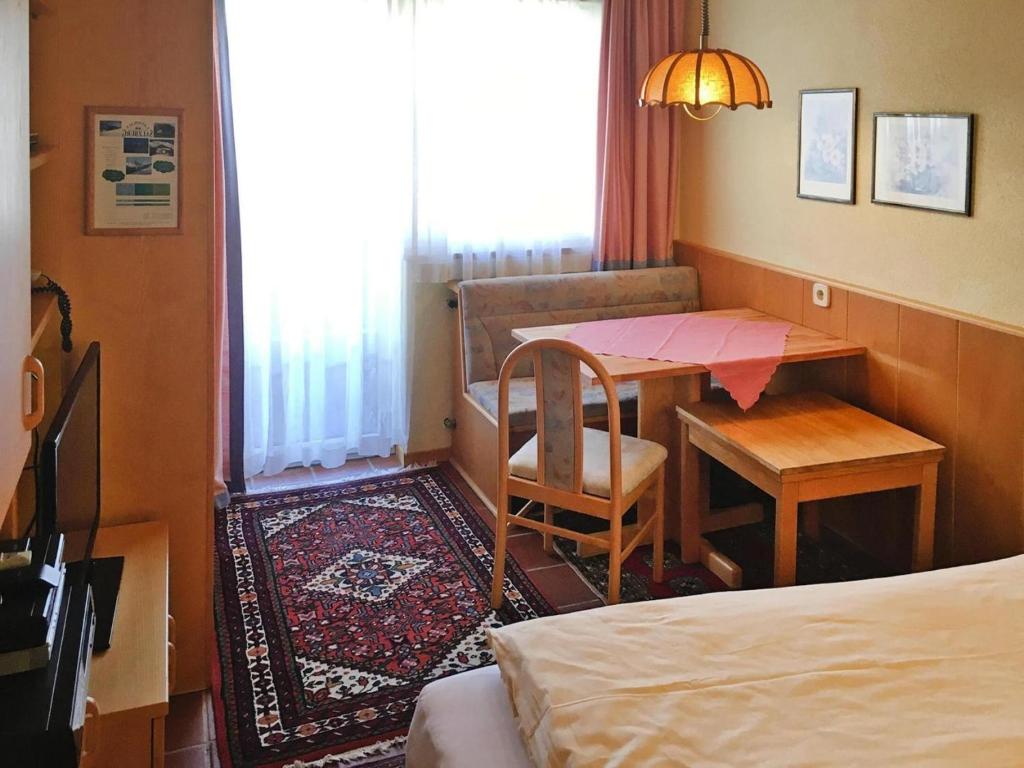 Posteľ alebo postele v izbe v ubytovaní Landhaus Salzburg, Dienten