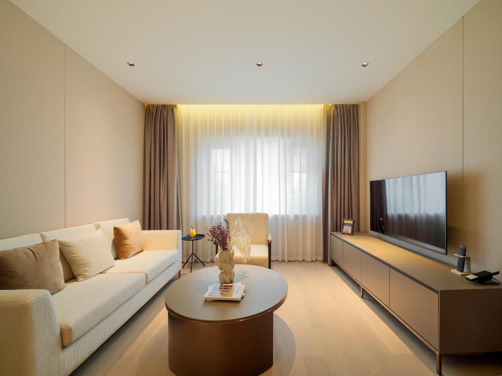 TV a/nebo společenská místnost v ubytování Donghu Collection Hotel