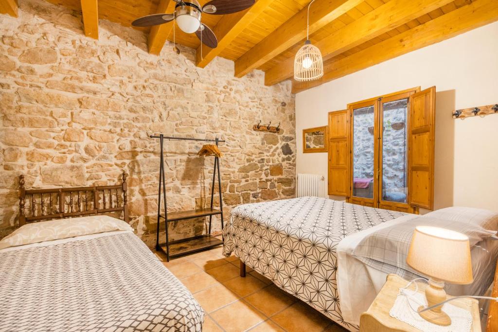 Postel nebo postele na pokoji v ubytování Casabras Rural