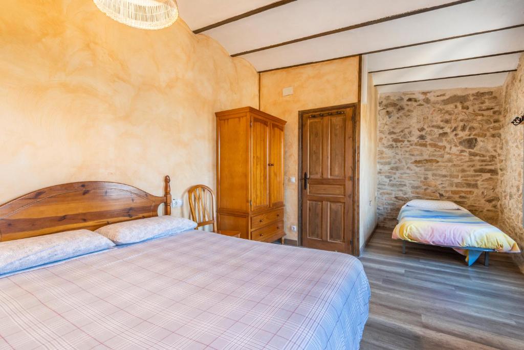 Postel nebo postele na pokoji v ubytování Casabras Rural