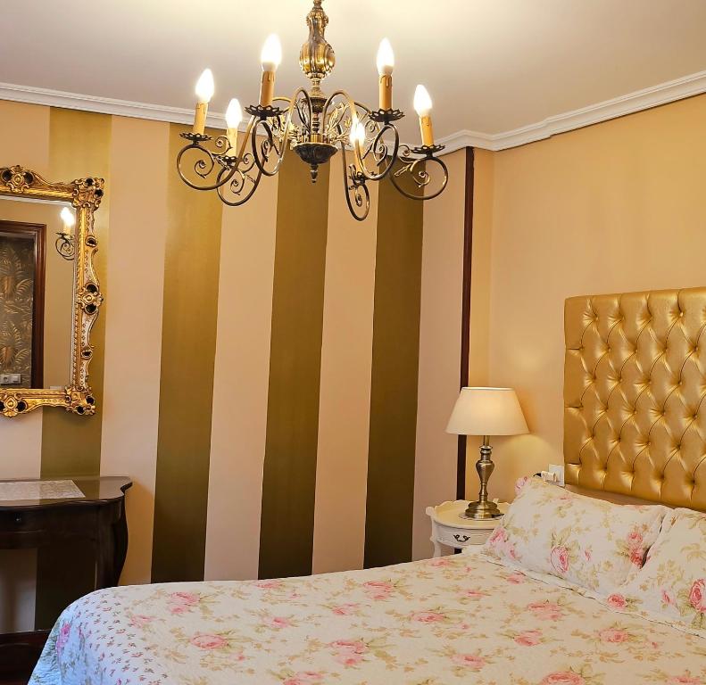 Postel nebo postele na pokoji v ubytování La Casa de Begoña