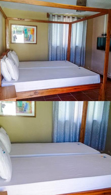 Postel nebo postele na pokoji v ubytování Culla Lodge