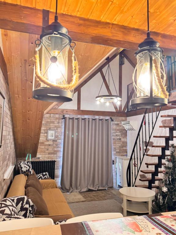 Posezení v ubytování Happy Holidays Apartments in New Gudauri