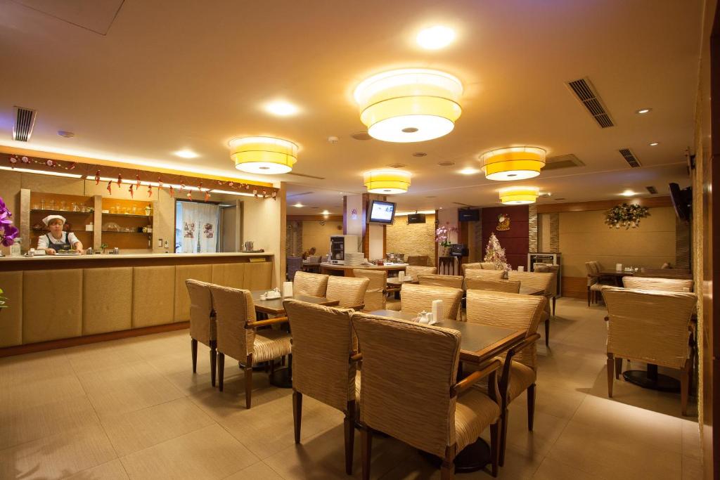 Posezení v ubytování Rich Garden Hotel