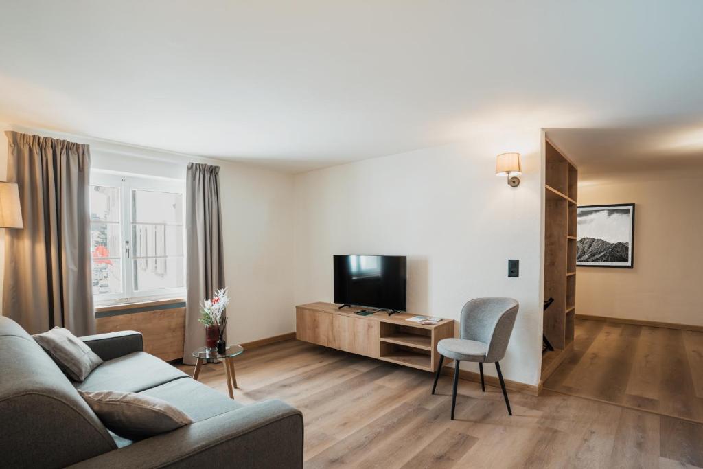 TV a/nebo společenská místnost v ubytování Hotel Brocco & Posta