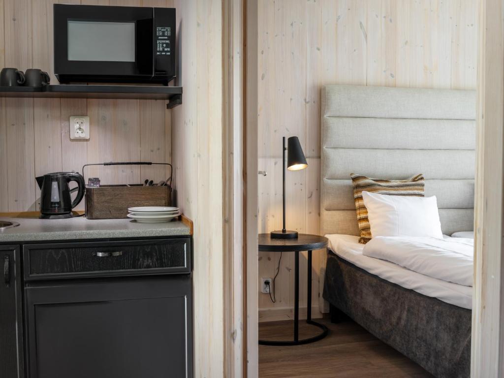 Postel nebo postele na pokoji v ubytování Ice Hotel