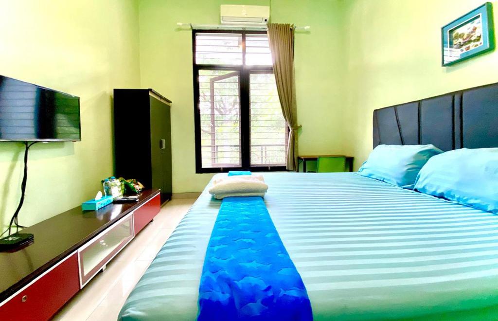 Postel nebo postele na pokoji v ubytování Serafinna Guest House