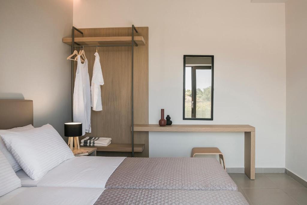 Postel nebo postele na pokoji v ubytování Petradi Villas Skala