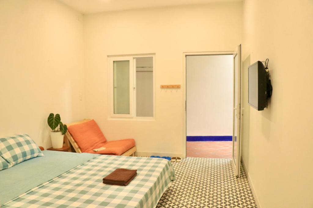 Postel nebo postele na pokoji v ubytování Sea For Rest Homestay