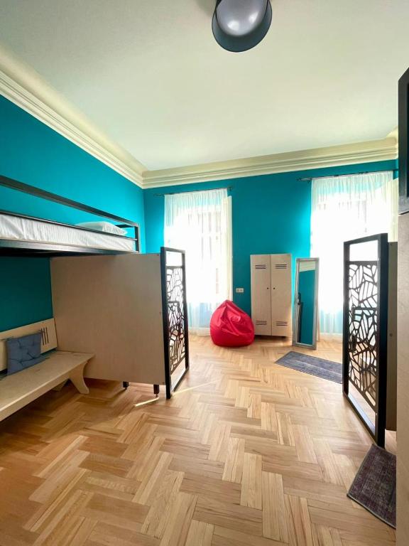 Postel nebo postele na pokoji v ubytování Communa Good Vibes