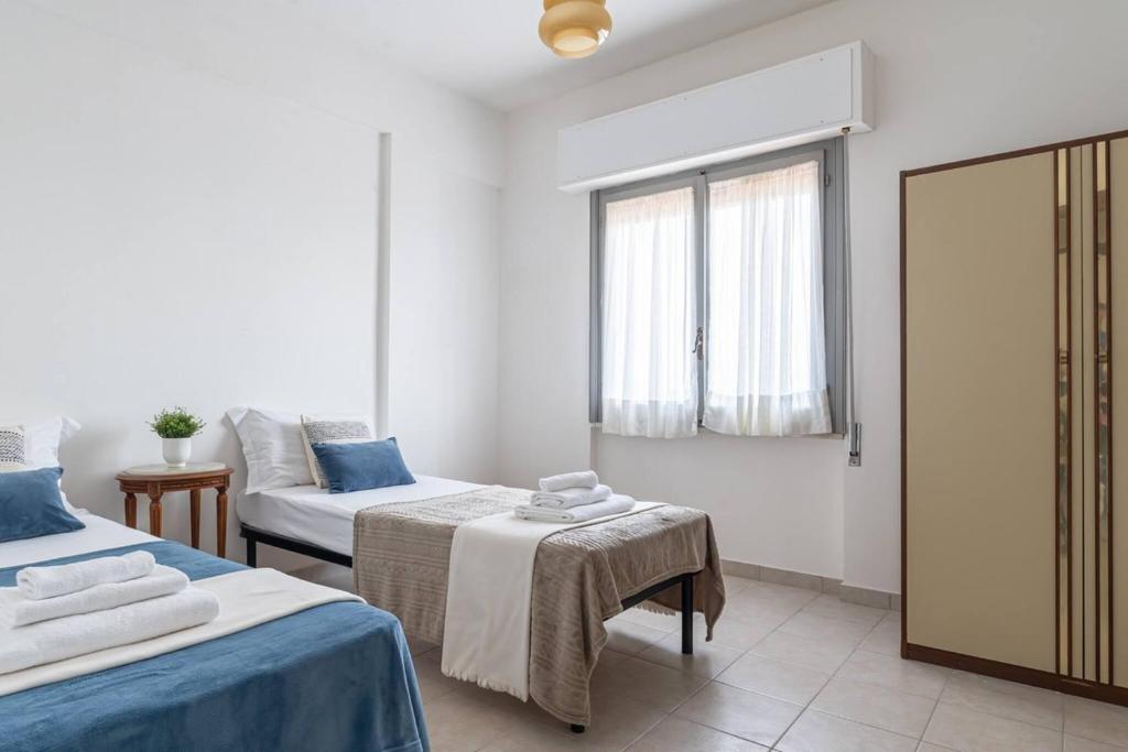 Postel nebo postele na pokoji v ubytování Lungomare 90 - YourPlace Abruzzo