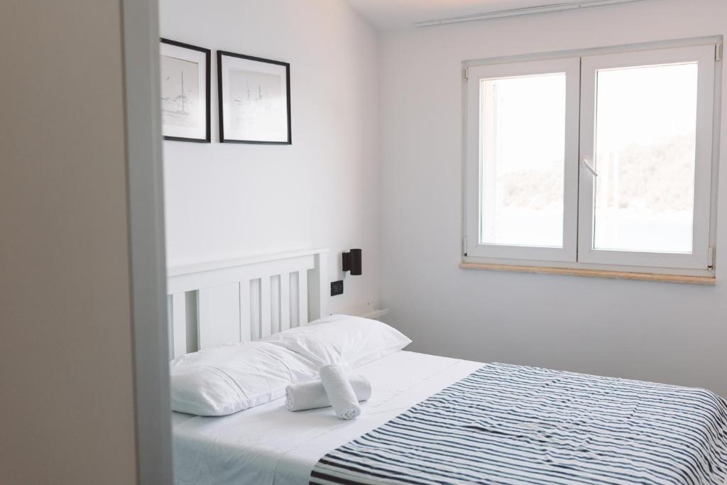 Postel nebo postele na pokoji v ubytování Accommodation Triton