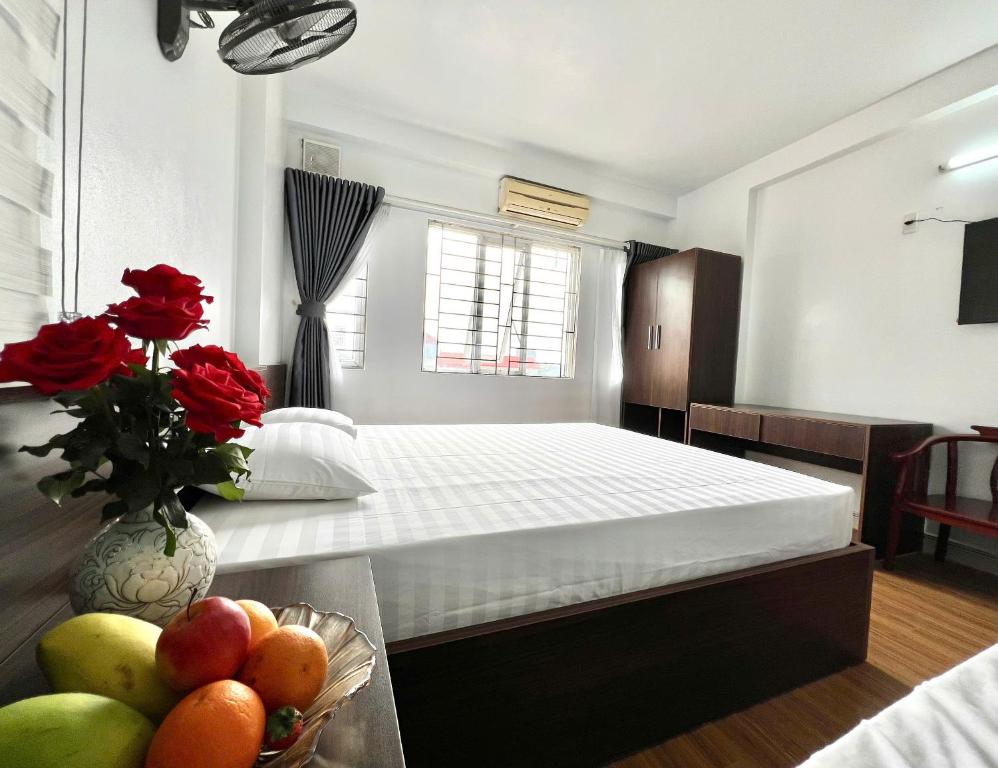 Postel nebo postele na pokoji v ubytování Noi Bai Sunflower Hotel