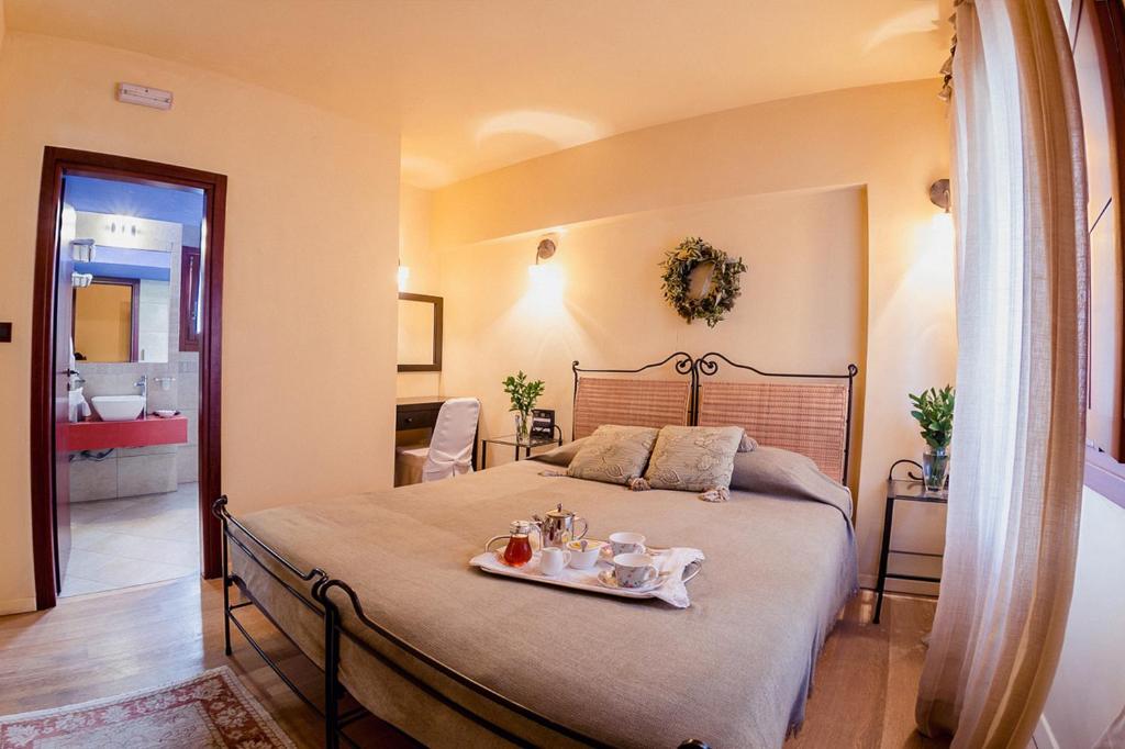 Postel nebo postele na pokoji v ubytování Avalon Boutique Hotel Rhodes