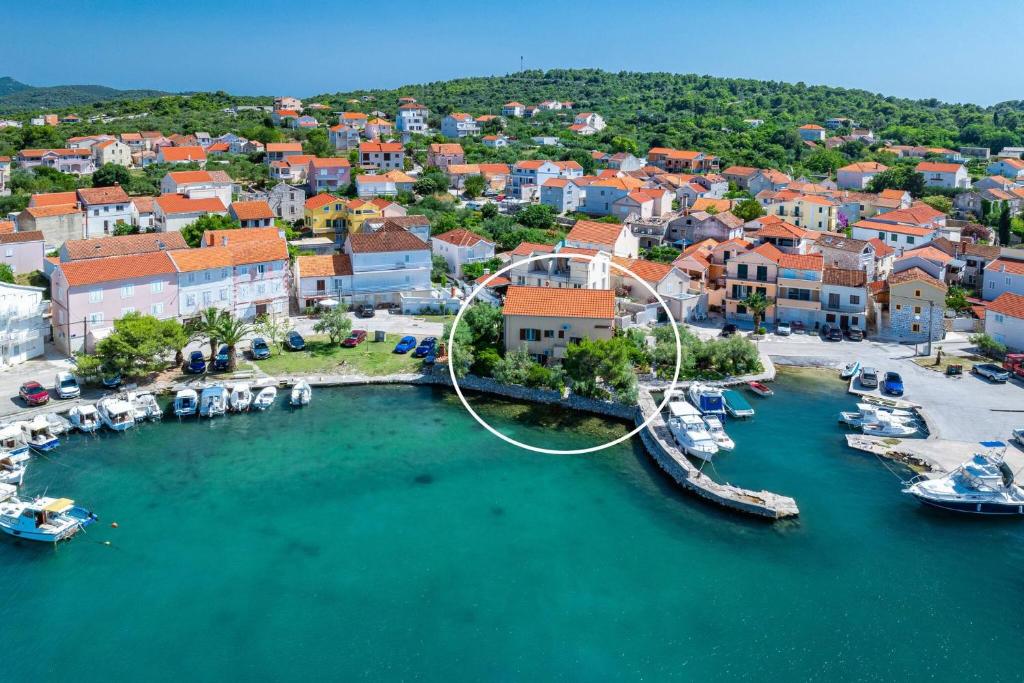 an aerial view of a marina with boats in the water at Apartments Kukljica Ugljan in Kukljica