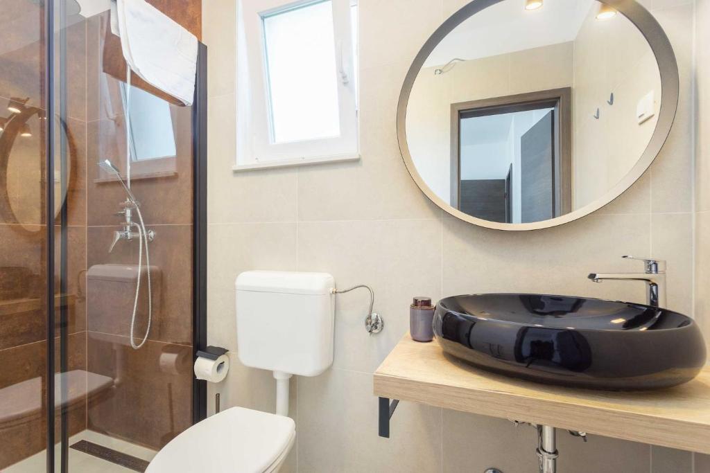 Kúpeľňa v ubytovaní Holiday Home Greta