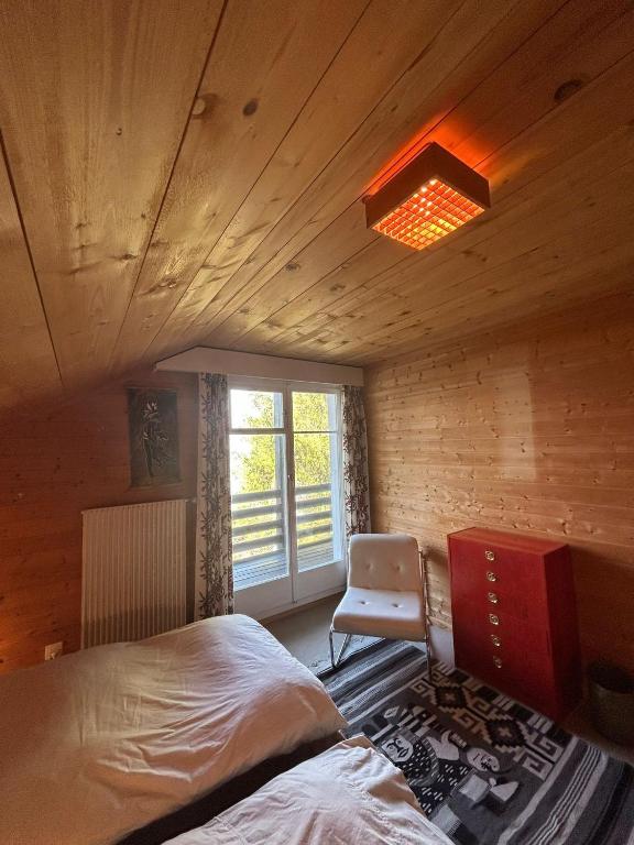เตียงในห้องที่ Cache-Cache MOUNTAIN & QUIET chalet 10 pers