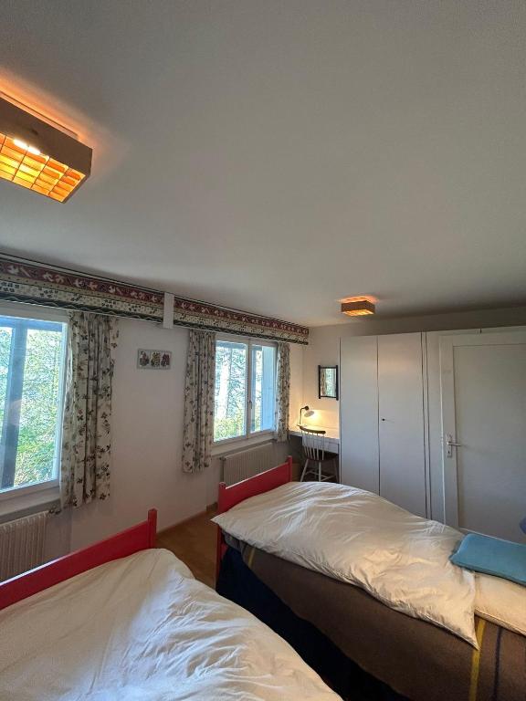 เตียงในห้องที่ Cache-Cache MOUNTAIN & QUIET chalet 10 pers