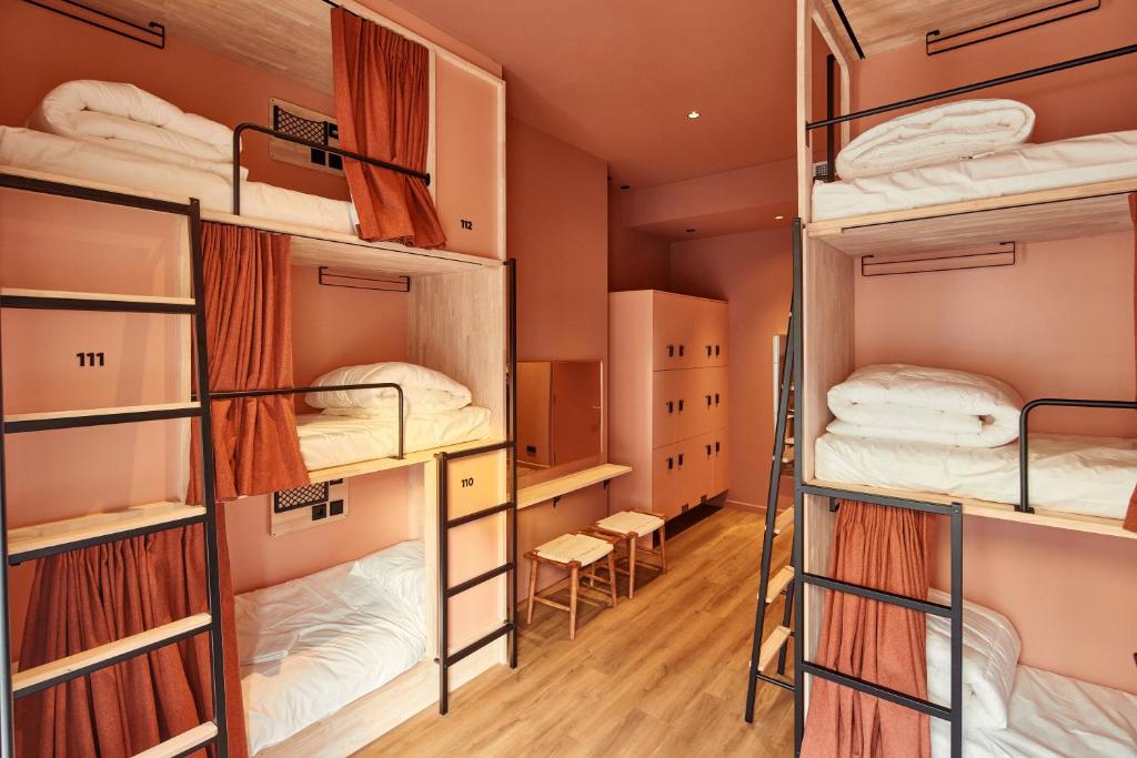 Postel nebo postele na pokoji v ubytování The Elephant Hostel