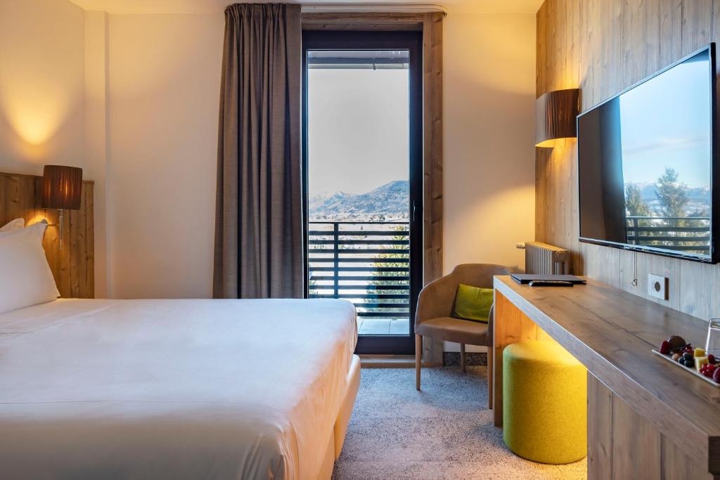 Postel nebo postele na pokoji v ubytování Linta Hotel Wellness & Spa