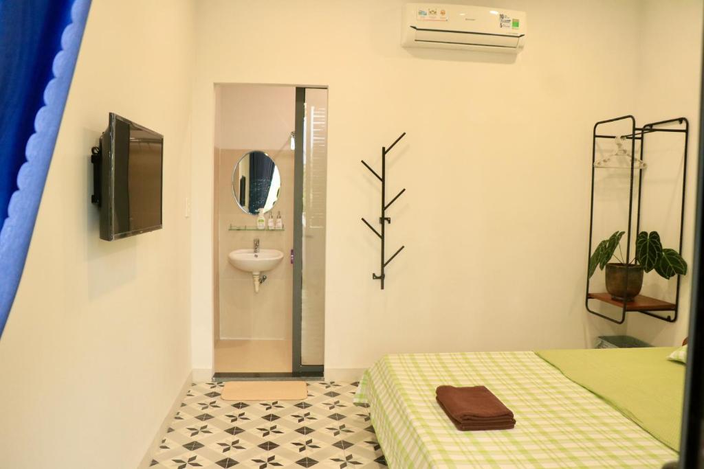 TV a/nebo společenská místnost v ubytování Sea For Rest Homestay