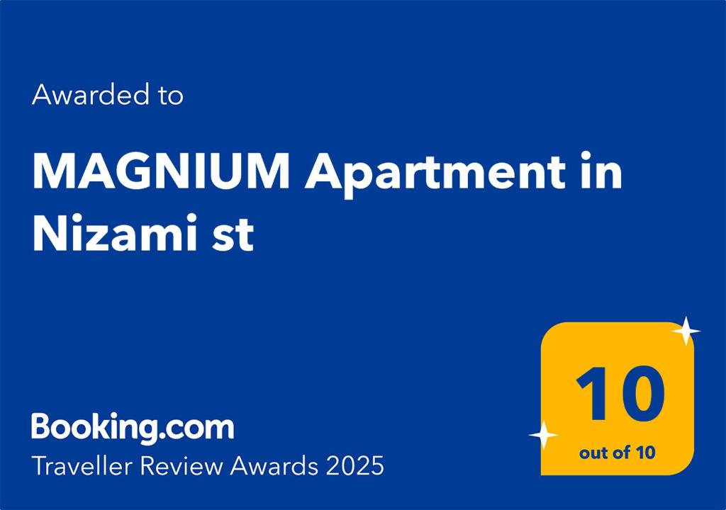 un signo amarillo con las palabras designación máxima en nissanvantkt en MAGNIUM Apartment in Nizami st, en Baku