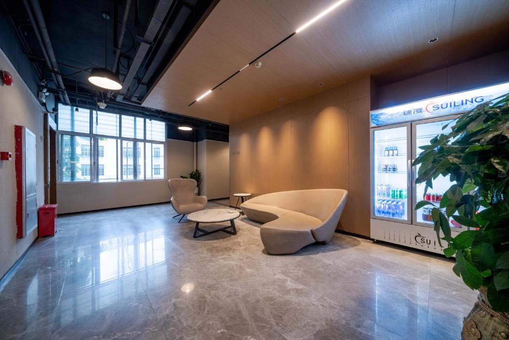 Posezení v ubytování Xicheng International Hotel Guangzhou Sanyuanli Jiangxia Metro Station Branch