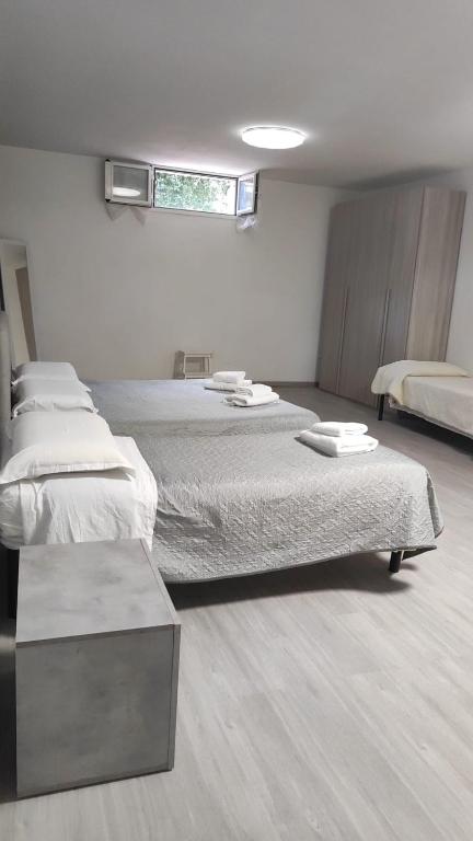 Postel nebo postele na pokoji v ubytování B&B La Pace Ardea