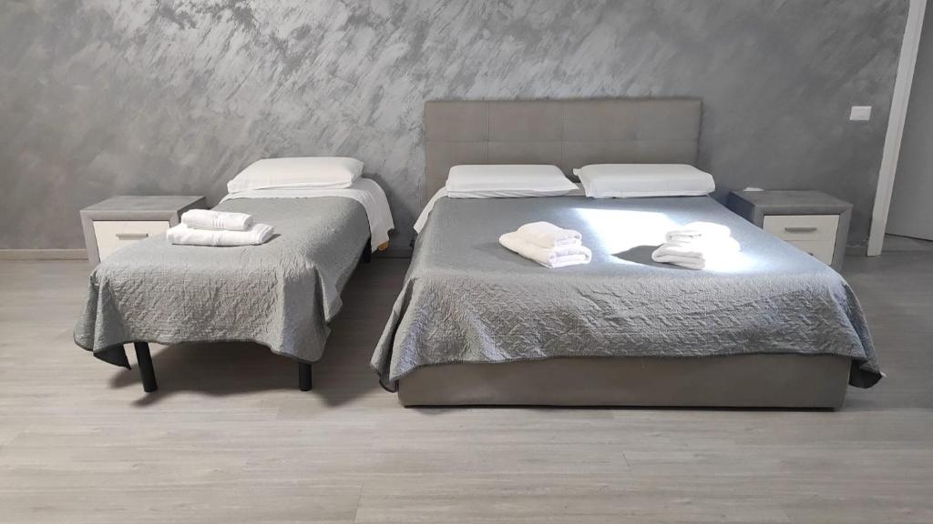 Postel nebo postele na pokoji v ubytování B&B La Pace Ardea