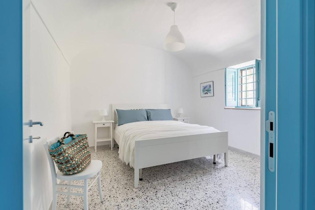 Postel nebo postele na pokoji v ubytování La casa di Maria - YourPlace Abruzzo