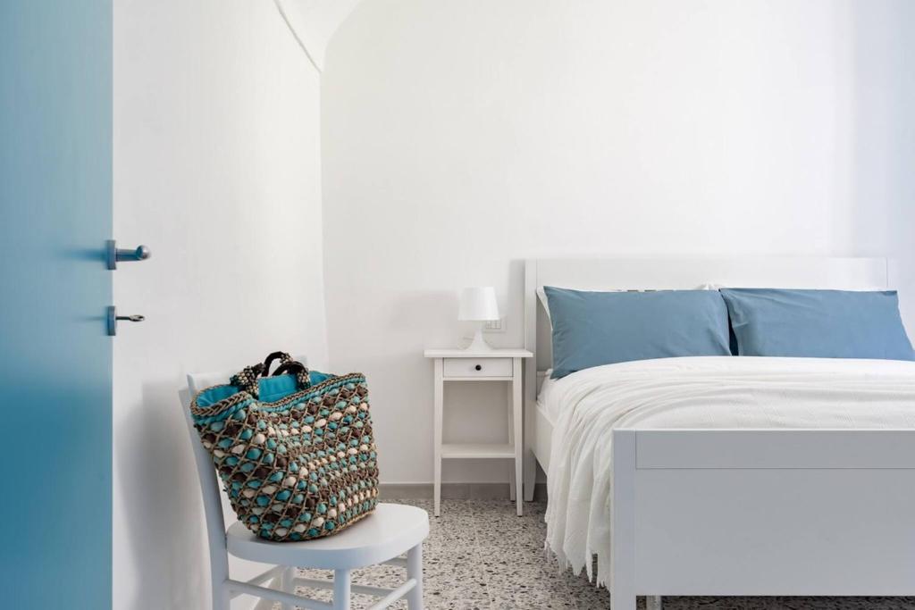 Postel nebo postele na pokoji v ubytování La casa di Maria - YourPlace Abruzzo