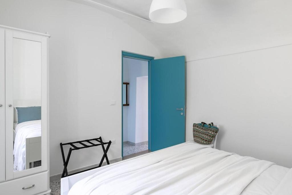 Postel nebo postele na pokoji v ubytování La casa di Maria - YourPlace Abruzzo