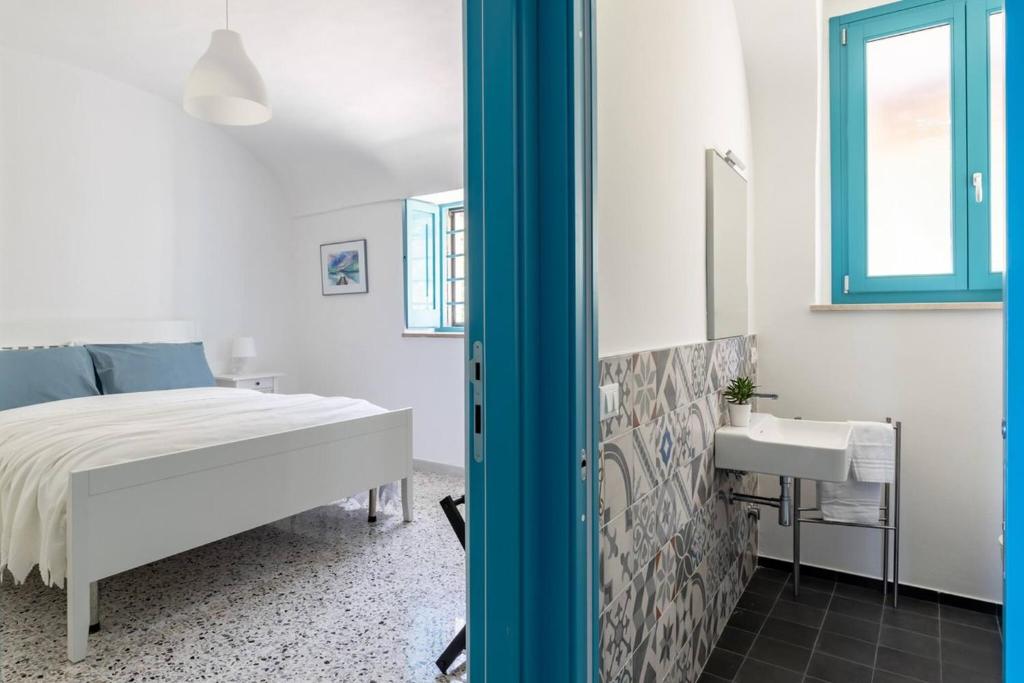 Postel nebo postele na pokoji v ubytování La casa di Maria - YourPlace Abruzzo