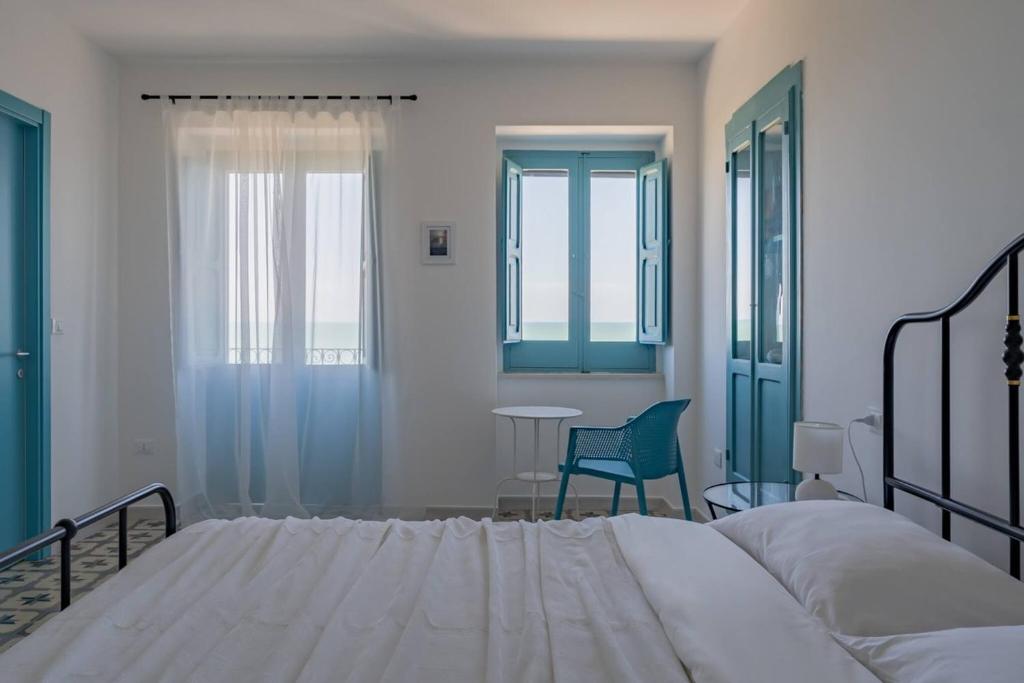 Postel nebo postele na pokoji v ubytování La casa di Maria - YourPlace Abruzzo