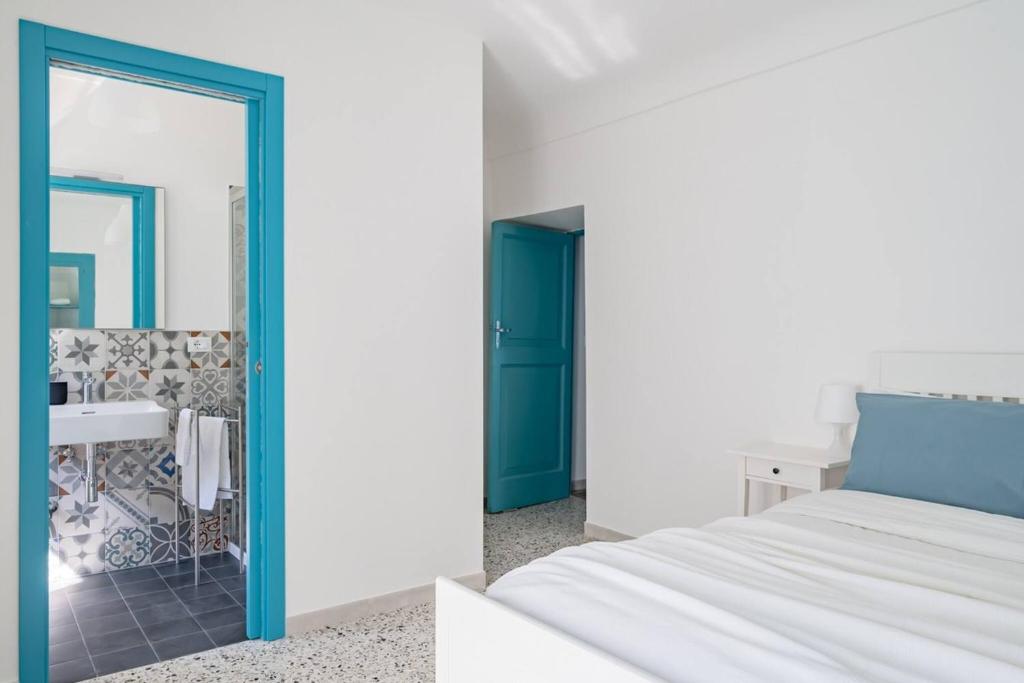 Postel nebo postele na pokoji v ubytování La casa di Maria - YourPlace Abruzzo