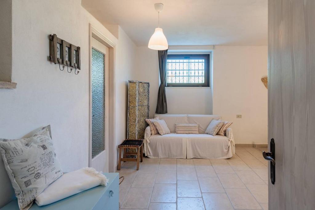 Postel nebo postele na pokoji v ubytování Il fico nel Pozzo - YourPlace Abruzzo