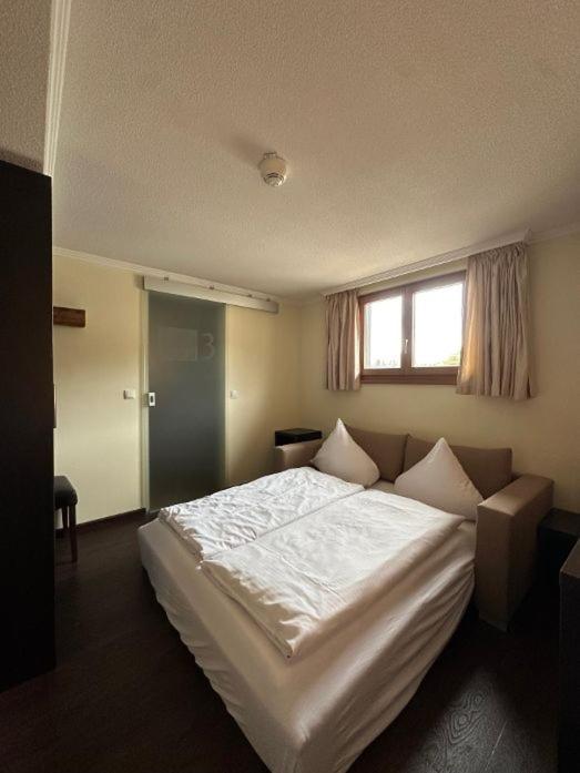 A bed or beds in a room at S'Matt 3